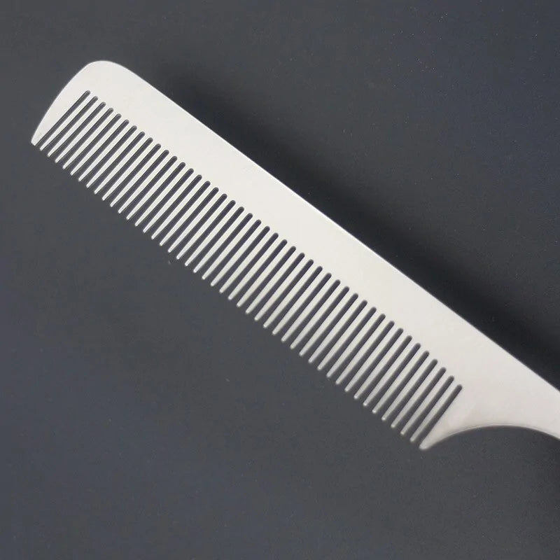 Peine de peluquero plateado de acero inoxidable
