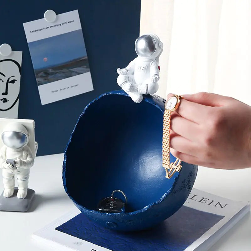Figuras creativas organizadoras de almacenamiento de astronautas