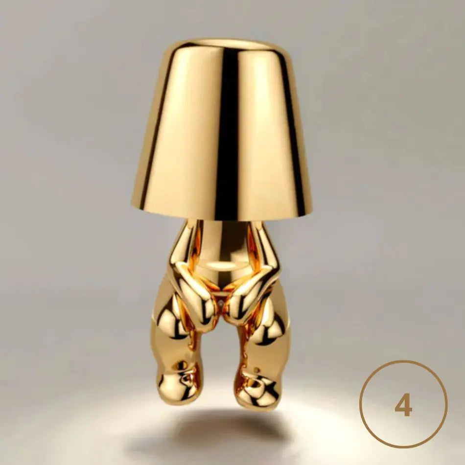 Luz nocturna del hombre dorado