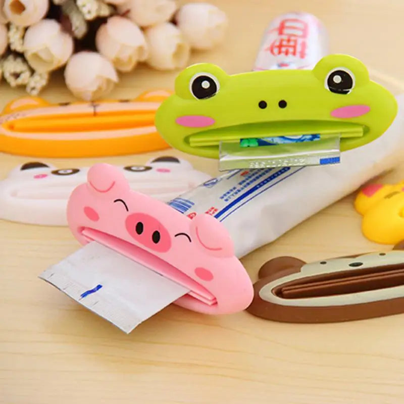 Dispensador de pasta de dientes para el hogar y el baño, exprimidor de pasta dental de plástico, Soporte rodante, 1 piezas