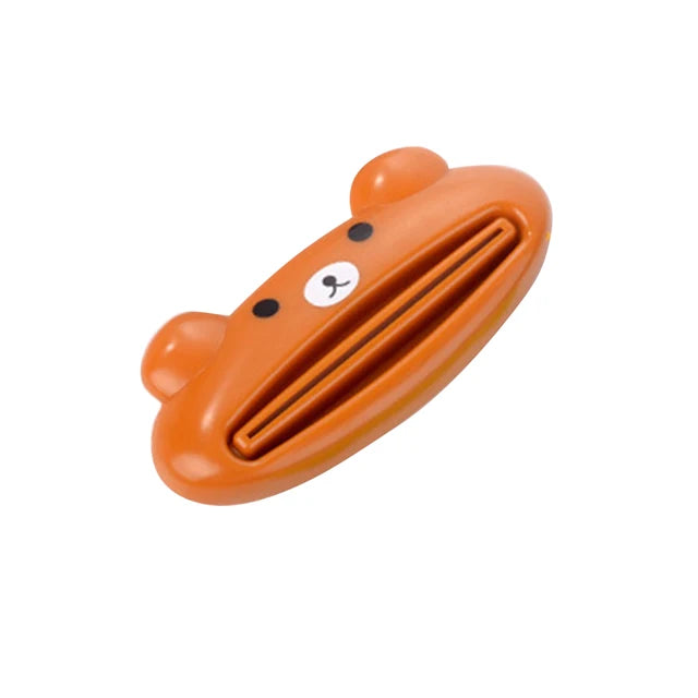 Dispensador de pasta de dientes para el hogar y el baño, exprimidor de pasta dental de plástico, Soporte rodante, 1 piezas