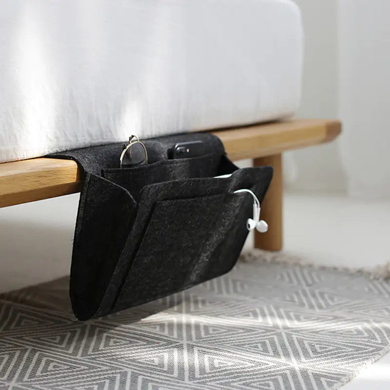 Bolsa de almacenamiento junto a la cama