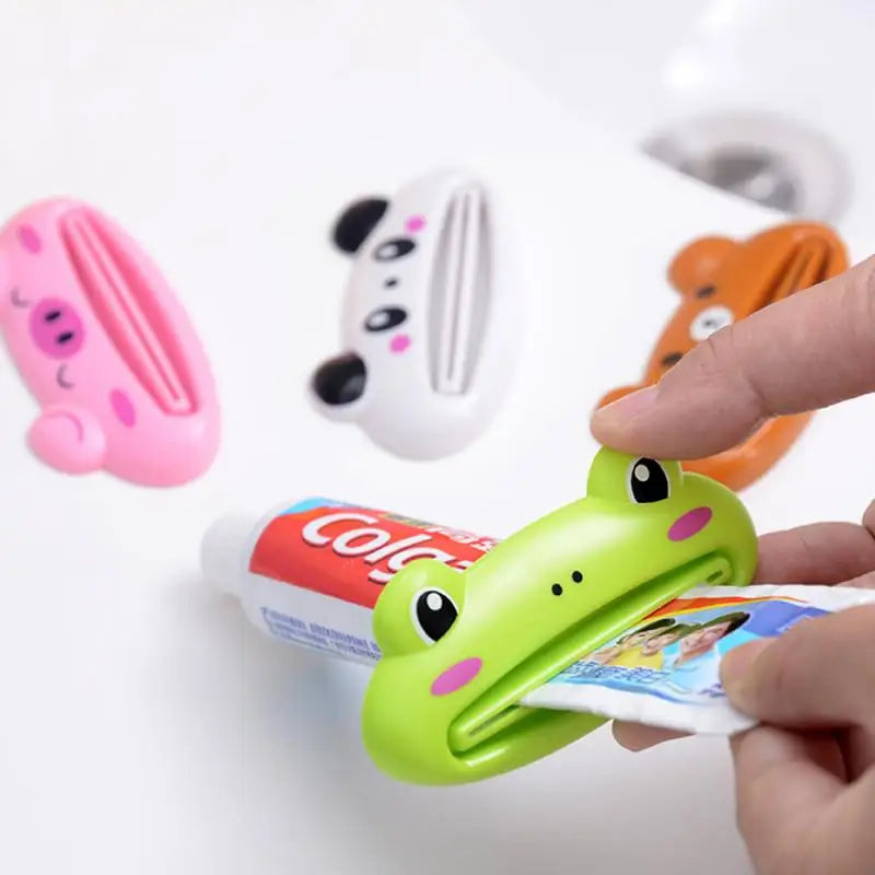 Dispensador de pasta de dientes para el hogar y el baño, exprimidor de pasta dental de plástico, Soporte rodante, 1 piezas