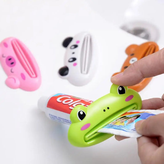Dispensador de pasta de dientes para el hogar y el baño, exprimidor de pasta dental de plástico, Soporte rodante, 1 piezas
