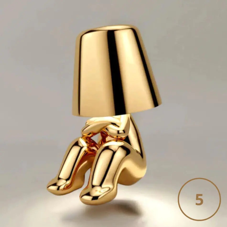 Luz nocturna del hombre dorado