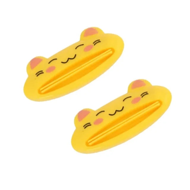 Dispensador de pasta de dientes para el hogar y el baño, exprimidor de pasta dental de plástico, Soporte rodante, 1 piezas